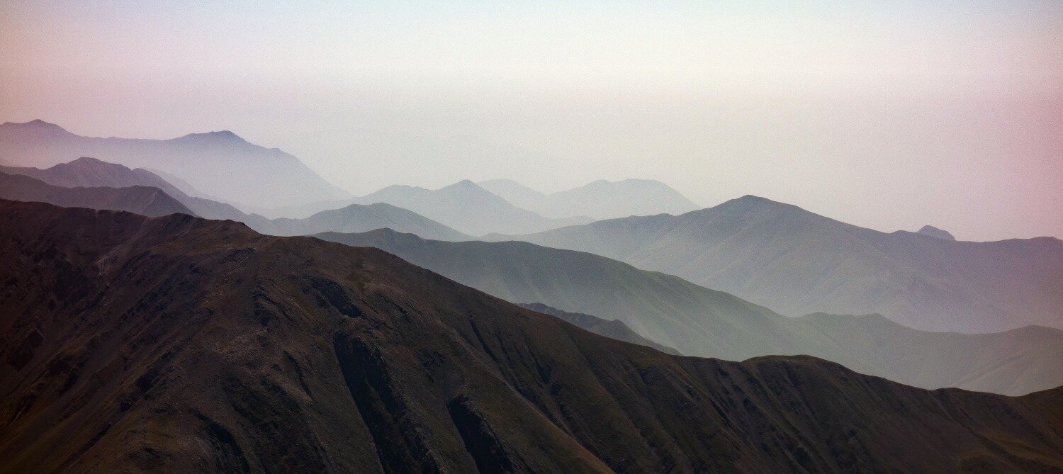 The layered ridges of the Azerbaijani Caucasus stretching into the distance.