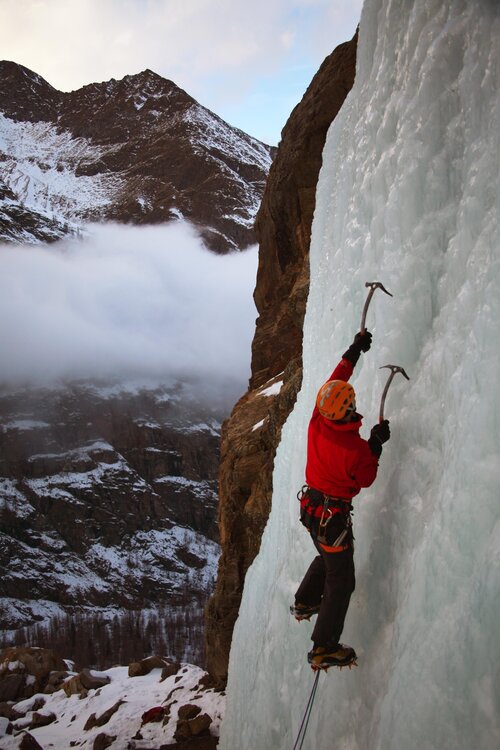 At the top of the Aosta Valley on the Italian side of the Mont Blanc massif, Cogne is one of the best ice climbing venues in the whole of Europe - Ouray, Colorado but with better coffee. Here, Neil Gresham moves up the lower section of the Patri Gauche (WI4+) on high quality ice in the depths of winter. The sustained low temperatures in the Cogne valley can guarantee good ice when other venues nearby may be out of condition.