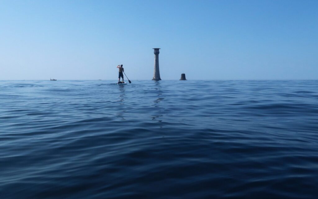 Having made it through the tide race on the approach to their objective, the team reach the shallow waters surrounding the Eddystone Reef.