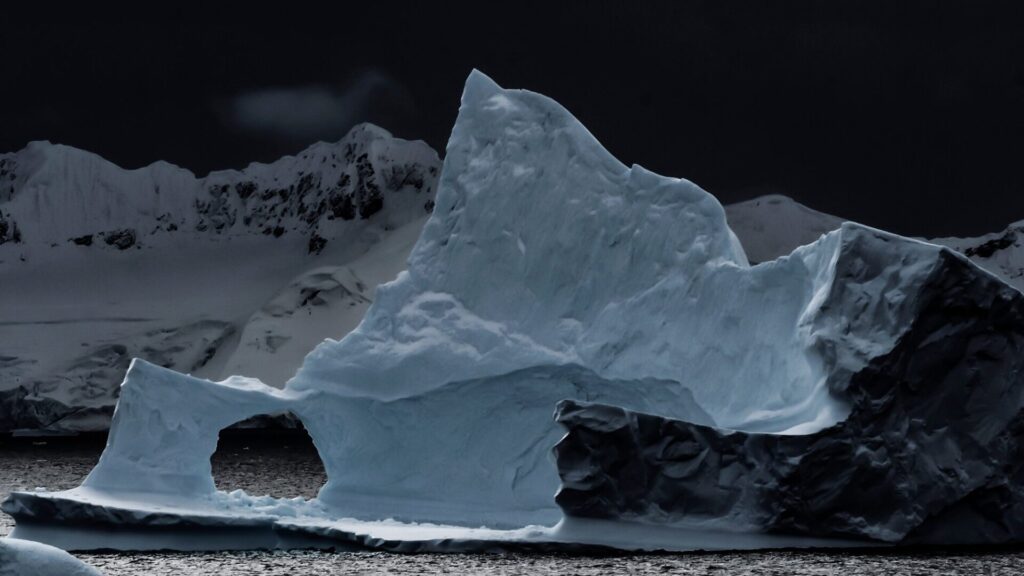 An iceberg shows the incredible sculpting forces of wind, rain and seawater.