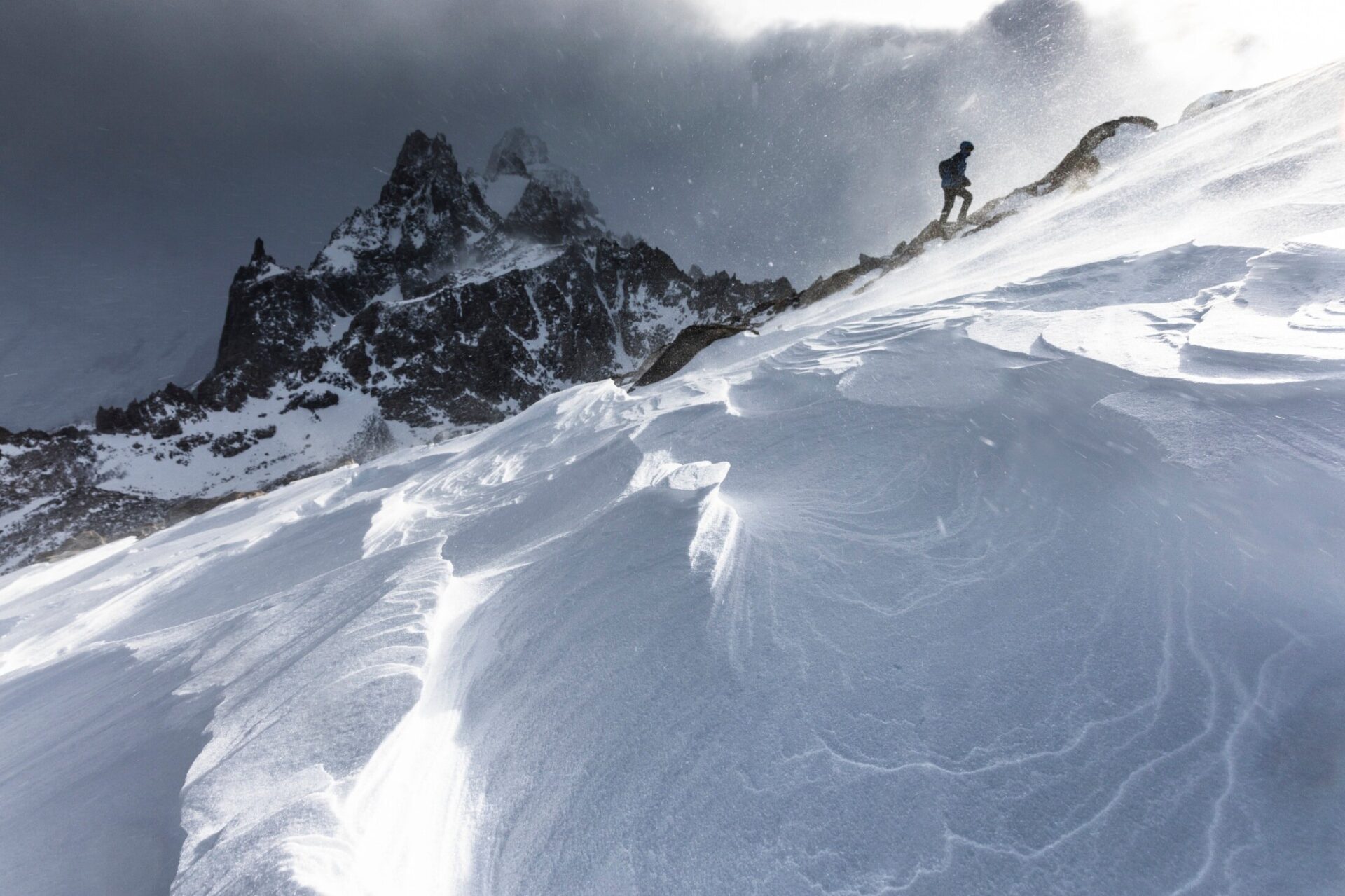 In the teeth of an incoming storm deep in the pathless terrain on a sub-peak in the Fitz Roy range of Argentine Patagonia.