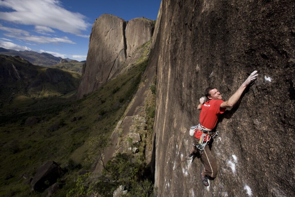 Jack Geldard practices an alternative and very difficult first pitch to Yellow Fever (7c max, 220m) on Lemur Wall - the team ended up abandoning this initial pitch and approaching the line from the right.