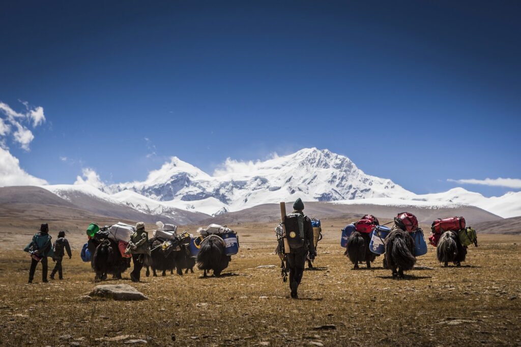 Climbers approaching Shishaoangma (8,013m), the only 800m+ peak which is entirely inside Tibet. The ascent of this mountain was particularly challenging logistically during ‘Project Possible’ in 2019 when he climbed all 14 8000m+ peaks in just over 6 months. © Marcin Kin / Red Bull