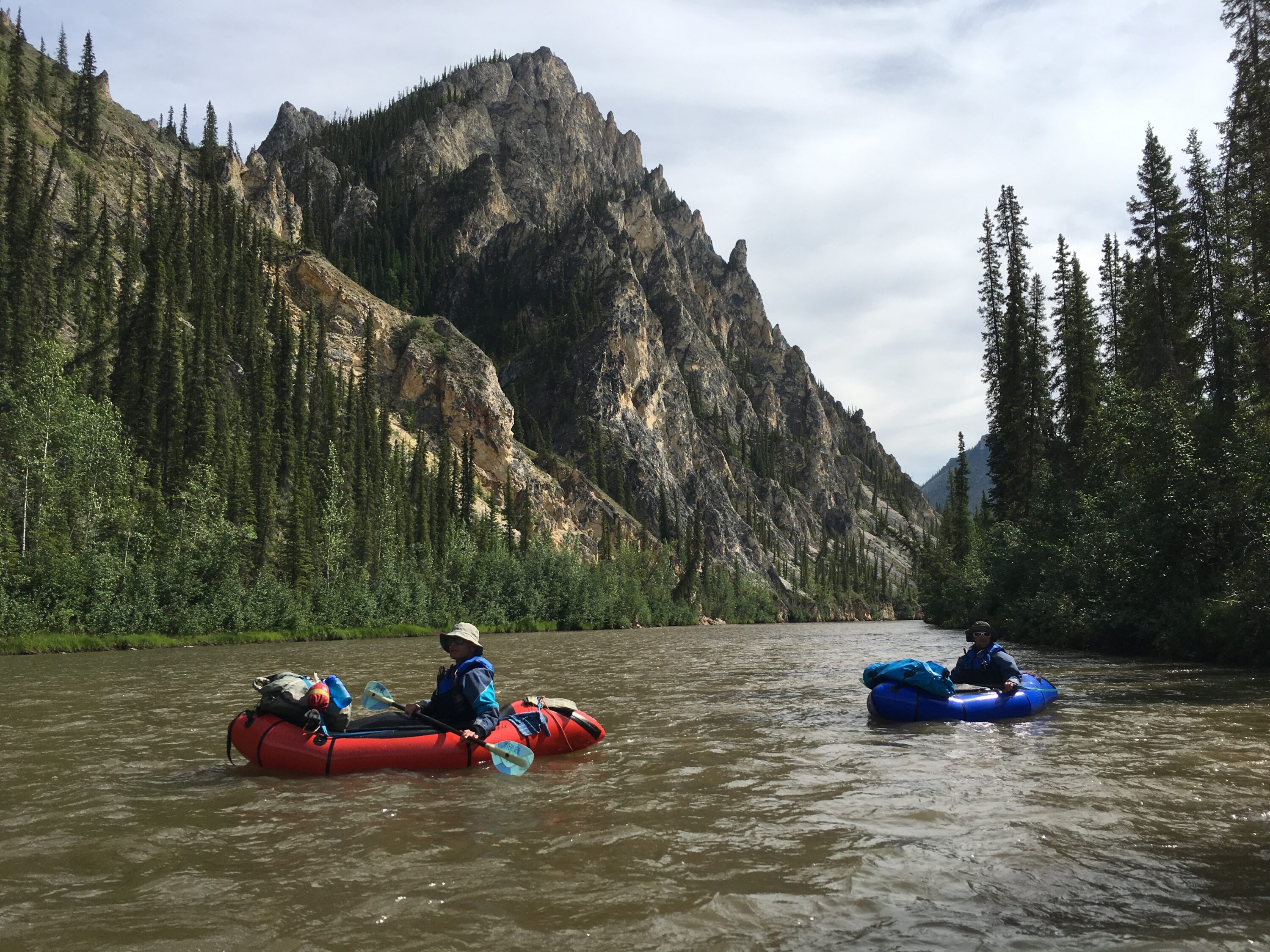 Oli and Ueli drift across the peaceful waters beneath Pinnacle Mountain (named by Jerry Dixon and Ron Watters).