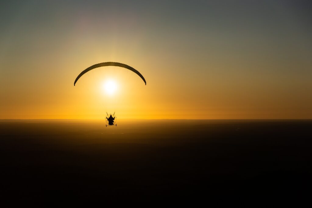 Paramotoring into the sunset, away from Broken Hill, NSW.
